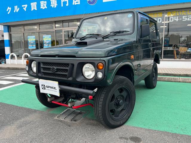 ＸＬリミテッド　５速ＭＴ　４ＷＤ　リフトアップ　ＥＴＣ　シートカバー　ルーフレール　ベネトンフォーミュラーワンハンドル　ターボタイマー　フォグランプ　純正１６インチアルミ　タイミングベルト交換済み(7枚目)