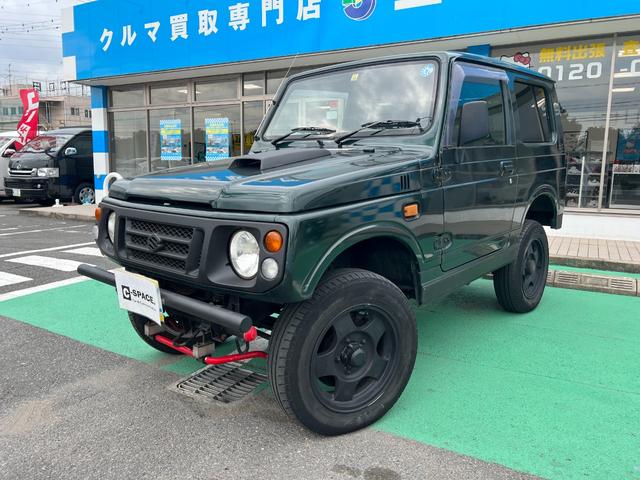 ＸＬリミテッド　５速ＭＴ　４ＷＤ　リフトアップ　ＥＴＣ　シートカバー　ルーフレール　ベネトンフォーミュラーワンハンドル　ターボタイマー　フォグランプ　純正１６インチアルミ　タイミングベルト交換済み(8枚目)