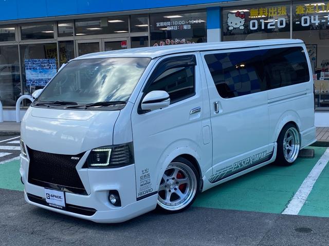 ハイエースバン ロングスーパーGL HKSスーパーチャージャー HKSF-CONiS HKSマフラー Pivotスロットルコントローラー essex19インチアルミ バットフェイスボンネット フルエアロ 前置きインタークーラー キーレス(3枚目)