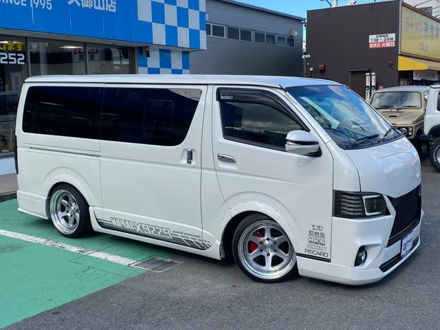 ハイエースバン ロングスーパーGL HKSスーパーチャージャー HKSF-CONiS HKSマフラー Pivotスロットルコントローラー essex19インチアルミ バットフェイスボンネット フルエアロ 前置きインタークーラー キーレス(6枚目)