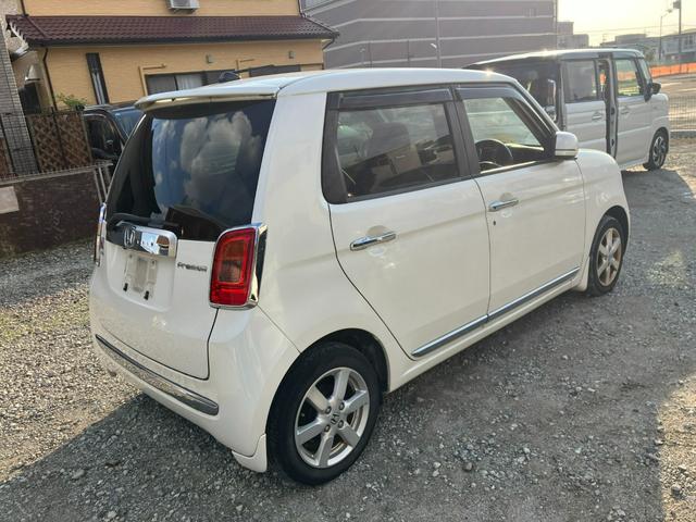 N-ONE プレミアム・Lパッケージ タイミングチェーン 純正ナビ・フルセグTV・バックモニター スマートキー プッシュスタート 純正14インチアルミ HIDヘッドライト 革調シートカバー ステアリングスイッチ アイドリングストップ(8枚目)