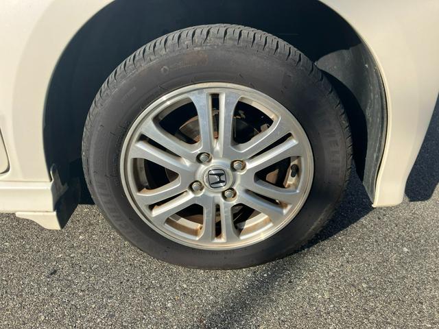 Ｎ－ＢＯＸカスタム Ｇ・Ｌパッケージ　タイミングチェーン　社外ナビ・フルセグＴＶ・Ｂｌｕｅｔｏｏｔｈ　左側パワースライドドア　ＥＴＣ　プッシュスタート　スマートキー　純正１４インチアルミ　ＨＩＤヘッドライト　ウインカー付電動格納ミラー（18枚目）