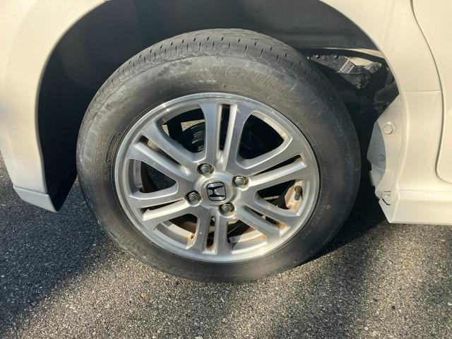 Ｎ－ＢＯＸカスタム Ｇ・Ｌパッケージ　タイミングチェーン　社外ナビ・フルセグＴＶ・Ｂｌｕｅｔｏｏｔｈ　左側パワースライドドア　ＥＴＣ　プッシュスタート　スマートキー　純正１４インチアルミ　ＨＩＤヘッドライト　ウインカー付電動格納ミラー（19枚目）