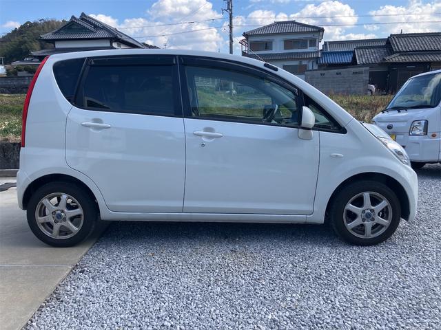 ムーヴ Ｘスペシャル　パナソニックナビ　ＴＶ　バックカメラ　キーレス　アルミホイール　電動格納ミラー　ミュージックプレイヤー接続　ＣＤ　後席フルフラット（4枚目）