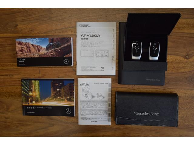 Gクラス G400d マヌファクトゥーアエディション 純正G63 22AW ブラバス製Fスポイラー G63仕様フロントバンパー ぱなめりかブラックラッピング 電動サイドステップ ガラススライディングルーフ ブルメスター ブラック&グレーレザーシート(24枚目)