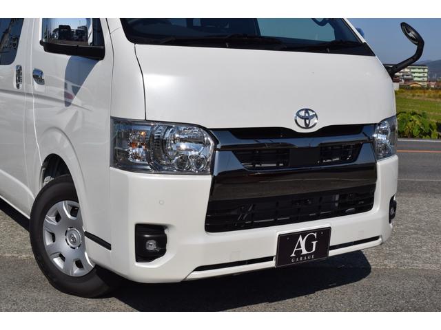 ハイエースバン スーパーGL ダークプライムII 衝突軽減/小窓/デジタルインナーミラー/レーンキープ/全方位カメラ/レーンキープ/ハーフレザーシート/オートライト/オートマチックハイビーム/室内フロアーマット付き/小物入れ/エアーバック/(18枚目)