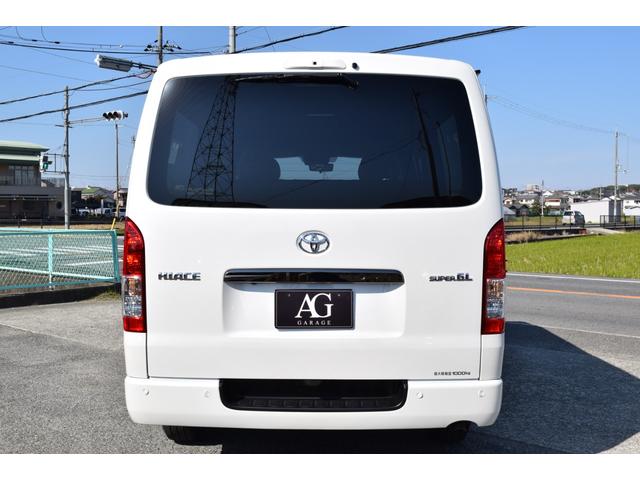 ハイエースバン スーパーGL ダークプライムII 衝突軽減/小窓/デジタルインナーミラー/レーンキープ/全方位カメラ/レーンキープ/ハーフレザーシート/オートライト/オートマチックハイビーム/室内フロアーマット付き/小物入れ/エアーバック/(25枚目)