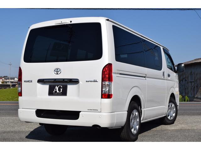 ハイエースバン スーパーGL ダークプライムII 衝突軽減/小窓/デジタルインナーミラー/レーンキープ/全方位カメラ/レーンキープ/ハーフレザーシート/オートライト/オートマチックハイビーム/室内フロアーマット付き/小物入れ/エアーバック/(27枚目)