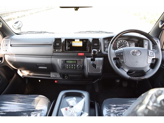 ハイエースバン スーパーGL ダークプライムII 衝突軽減/小窓/デジタルインナーミラー/レーンキープ/全方位カメラ/レーンキープ/ハーフレザーシート/オートライト/オートマチックハイビーム/室内フロアーマット付き/小物入れ/エアーバック/(52枚目)