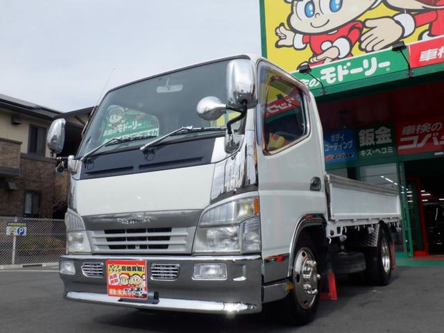 キャンター 全低床平ボディー２ｔ　花魁メッキ　ジェネレーション　静岡県産当社下取車　平１０尺ボディー　床あおり鉄板貼り　縞板プロテクタ　ステンレスフェンダ　社外キルトドロヨケ　ＬＥＤサイドマーカー　メッキパーツ　ホイールライナ　花魁ＬＥＤテールランプ＆シーケンＷ（11枚目）