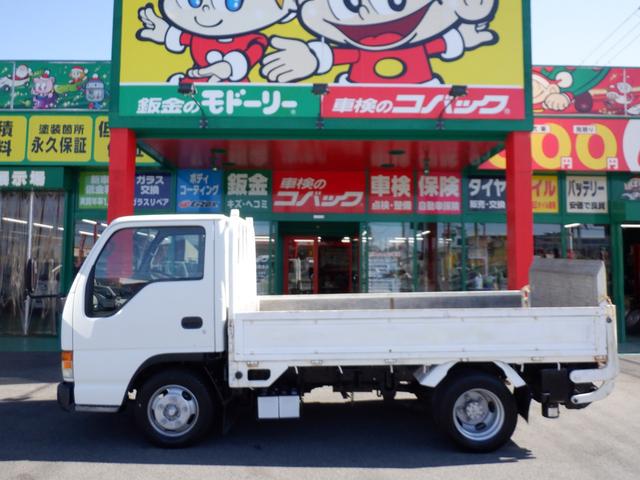 アトラストラック アーム式パワーゲート新明和　平床２ｔ　４ナンバー　荷台床縞鉄　茨木県産ワンオーナー自社下取車　５ＭＴ　２ＷＤ　新明和パワーゲートアーム式　左電格ミラー　荷台床縞鋼板鉄板貼　ＮＯＸ／ＰＭ対策地域外　レザー調シートカバー　ＥＴＣ　新タイヤ交換（5枚目）