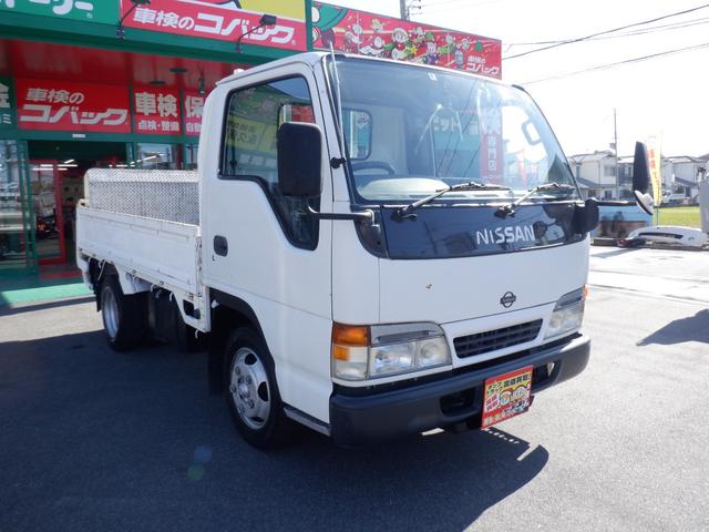 アトラストラック アーム式パワーゲート新明和　平床２ｔ　４ナンバー　荷台床縞鉄　茨木県産ワンオーナー自社下取車　５ＭＴ　２ＷＤ　新明和パワーゲートアーム式　左電格ミラー　荷台床縞鋼板鉄板貼　ＮＯＸ／ＰＭ対策地域外　レザー調シートカバー　ＥＴＣ　新タイヤ交換（6枚目）