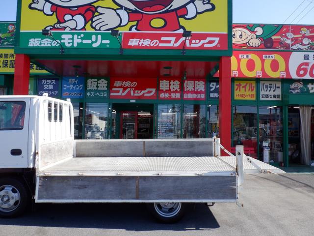 アトラストラック アーム式パワーゲート新明和　平床２ｔ　４ナンバー　荷台床縞鉄　茨木県産ワンオーナー自社下取車　５ＭＴ　２ＷＤ　新明和パワーゲートアーム式　左電格ミラー　荷台床縞鋼板鉄板貼　ＮＯＸ／ＰＭ対策地域外　レザー調シートカバー　ＥＴＣ　新タイヤ交換（35枚目）