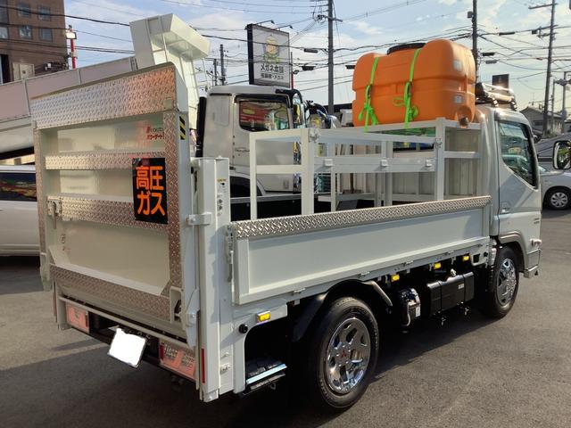 アトラストラック アーム式パワーゲート新明和　平床２ｔ　４ナンバー　荷台床縞鉄　茨木県産ワンオーナー自社下取車　５ＭＴ　２ＷＤ　新明和パワーゲートアーム式　左電格ミラー　荷台床縞鋼板鉄板貼　ＮＯＸ／ＰＭ対策地域外　レザー調シートカバー　ＥＴＣ　新タイヤ交換（66枚目）