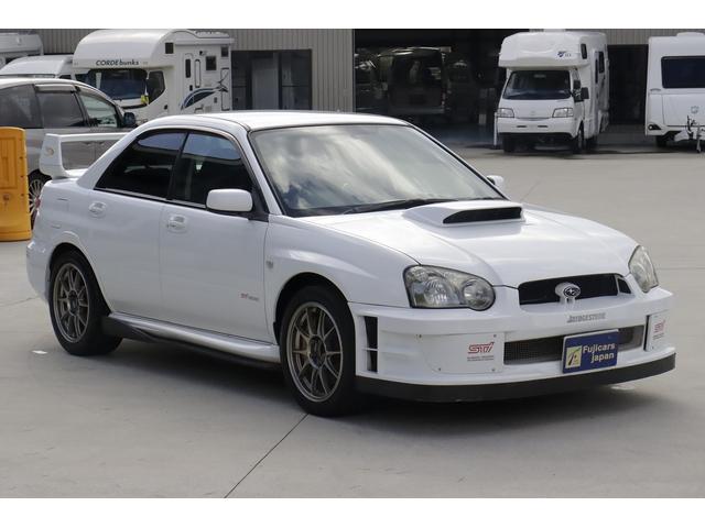 インプレッサ ＷＲＸ　ＳＴｉ　ストラーダメモリーナビ　エアロフロントバンパー　サイドカーボンスポイラー　フジツボマフラー　ウェッツスポーツ１７インチＡＷ　ＨＫＳターボタイマー　Ｄｅｆｉブースト計　ブリッツアルミラジエーター（6枚目）