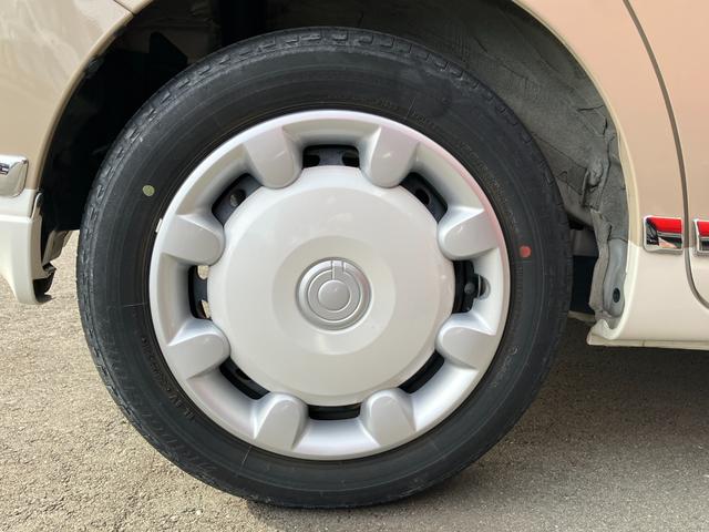 ムーヴキャンバス ＧメイクアップＶＳ　ＳＡＩＩＩ　１４インチフルホイールキャップ　ＬＥＤヘッドランプ　キーフリーシステム　両側パワースライドドア　オートエアコン（プッシュ式）　オートライト　置きラクボックス（10枚目）