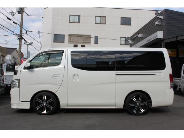 NV350キャラバンバン ロングライダープレミアムGXターボ PS PW AT 後席エアコン TVナビ ETC Dレコ レーダー バックカメラ 後席モニター シートカバー ベッドキット ローダウン 外品AW 両側スライドドア(3枚目)