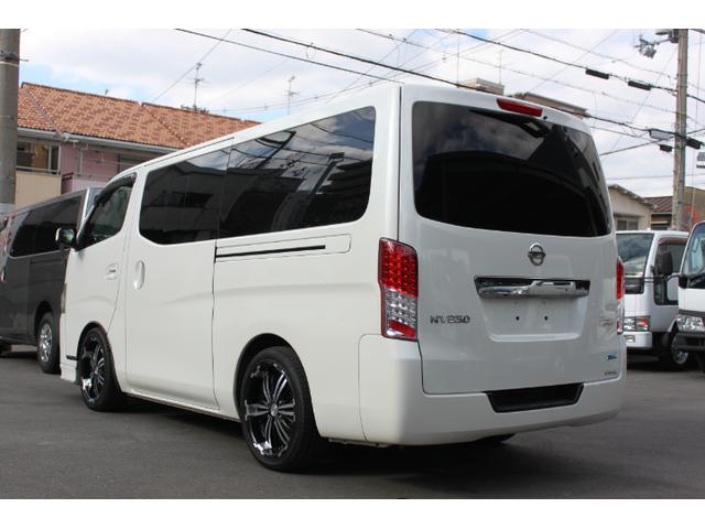 NV350キャラバンバン ロングライダープレミアムGXターボ PS PW AT 後席エアコン TVナビ ETC Dレコ レーダー バックカメラ 後席モニター シートカバー ベッドキット ローダウン 外品AW 両側スライドドア(4枚目)