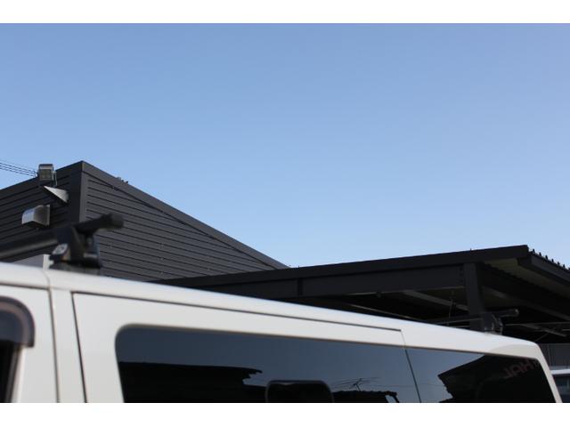 ＮＶ３５０キャラバンバン ロングプレミアムＧＸターボ　ＰＳ　ＰＷ　ＡＴ　リアエアコン　フルセグＴＶナビ　ＥＴＣ　バックカメラ　シートカバー　外品ＡＷ　ルーフキャリア　両側スライドドア（20枚目）