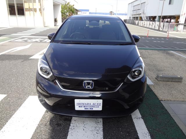 フィット ｅ：ＨＥＶホーム　９インチナビ　フルセグＴＶ　Ｂｌｕｅｔｏｏｔｈ　バックカメラ　ＥＴＣ　前後ドライブレコーダー　ＬＥＤヘッドライト　アルミ　衝突軽減ブレーキ　追随機能付きオートクルーズ　クリアランスソナー　スマートキー（2枚目）