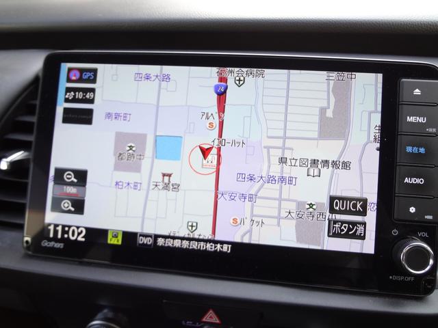 フィット ｅ：ＨＥＶホーム　９インチナビ　フルセグＴＶ　Ｂｌｕｅｔｏｏｔｈ　バックカメラ　ＥＴＣ　前後ドライブレコーダー　ＬＥＤヘッドライト　アルミ　衝突軽減ブレーキ　追随機能付きオートクルーズ　クリアランスソナー　スマートキー（6枚目）