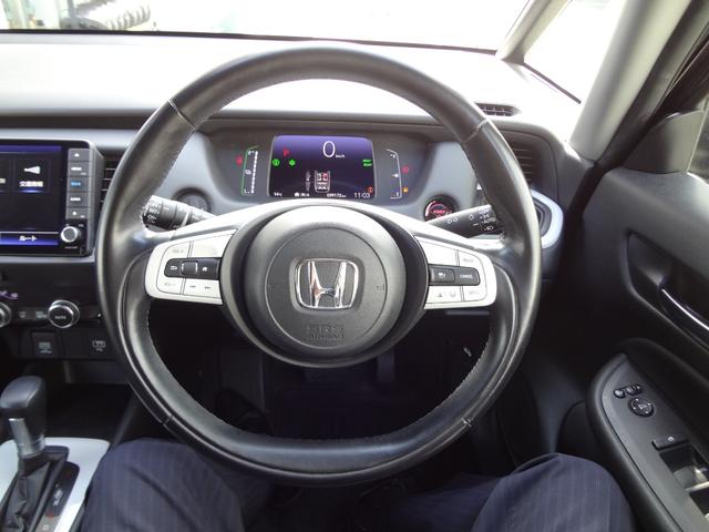 フィット ｅ：ＨＥＶホーム　９インチナビ　フルセグＴＶ　Ｂｌｕｅｔｏｏｔｈ　バックカメラ　ＥＴＣ　前後ドライブレコーダー　ＬＥＤヘッドライト　アルミ　衝突軽減ブレーキ　追随機能付きオートクルーズ　クリアランスソナー　スマートキー（14枚目）