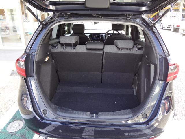 フィット ｅ：ＨＥＶホーム　９インチナビ　フルセグＴＶ　Ｂｌｕｅｔｏｏｔｈ　バックカメラ　ＥＴＣ　前後ドライブレコーダー　ＬＥＤヘッドライト　アルミ　衝突軽減ブレーキ　追随機能付きオートクルーズ　クリアランスソナー　スマートキー（19枚目）