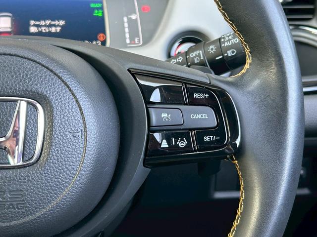 フィット ｅ：ＨＥＶ　ＲＳ　９型コネクトナビ　ドラレコ　ＥＴＣ　　　追従クルコン　ハーフレザーシート　ＬＥＤヘッドライト　衝突被害軽減ブレーキ　踏み間違い防止　障害物センサー　オートマチックハイビーム　純正アルミ　ＭＴモード付（18枚目）