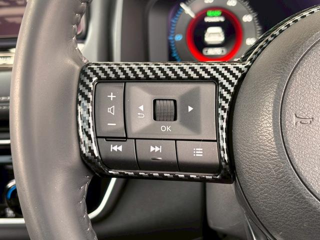 �n���h���ɂ́A�X�e�A�����O�X�C�b�`�ŃI�[�f�B�I�������𗣂������N���N�ł��B