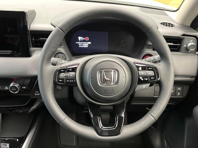 ヴェゼル ｅ：ＨＥＶ　Ｚ・ＰＬａＹパッケージ　ホンダセンシング　ハンズフリーパワーバックドア　車線逸脱警報　レーダークルーズコントロール　クリアランスソナー　パドルシフト　デュアルオートエアコン　オートエアコン　純正１８インチアルミ　オートライト（11枚目）