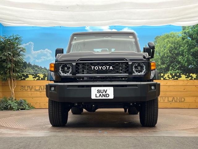 ランドクルーザー７０ ＡＸ　登録済未使用車　４ＷＤ　トヨタセーフティセンス　クルコン　ハーフレザーシート　オートマチックハイビーム　オートライト　ＬＥＤヘッドライト　レーンキープ　ダウンヒルアシスト　ウッドコンビステアリング（14枚目）