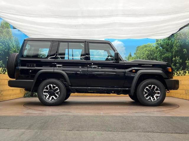 ランドクルーザー７０ ＡＸ　登録済未使用車　４ＷＤ　トヨタセーフティセンス　クルコン　ハーフレザーシート　オートマチックハイビーム　オートライト　ＬＥＤヘッドライト　レーンキープ　ダウンヒルアシスト　ウッドコンビステアリング（24枚目）