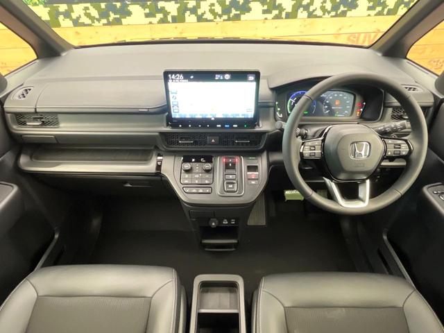 ステップワゴン ｅ：ＨＥＶスパーダ　登録済未使用車　純正１１型ナビ　両側電動ドア　パワーバックドア　ホンダセンシング　レーダークルーズコントロール　前席シートヒーター　ハーフレザーシート　ＬＥＤヘッドライト　前席シートバックテーブル（2枚目）