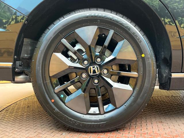 ステップワゴン ｅ：ＨＥＶスパーダ　登録済未使用車　純正１１型ナビ　両側電動ドア　パワーバックドア　ホンダセンシング　レーダークルーズコントロール　前席シートヒーター　ハーフレザーシート　ＬＥＤヘッドライト　前席シートバックテーブル（18枚目）