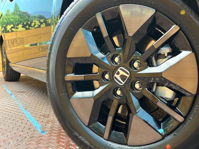 ステップワゴン ｅ：ＨＥＶスパーダ　登録済未使用車　純正１１型ナビ　両側電動ドア　パワーバックドア　ホンダセンシング　レーダークルーズコントロール　前席シートヒーター　ハーフレザーシート　ＬＥＤヘッドライト　前席シートバックテーブル（26枚目）