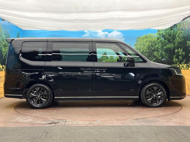 ステップワゴン ｅ：ＨＥＶスパーダ　登録済未使用車　純正１１型ナビ　両側電動ドア　パワーバックドア　ホンダセンシング　レーダークルーズコントロール　前席シートヒーター　ハーフレザーシート　ＬＥＤヘッドライト　前席シートバックテーブル（32枚目）