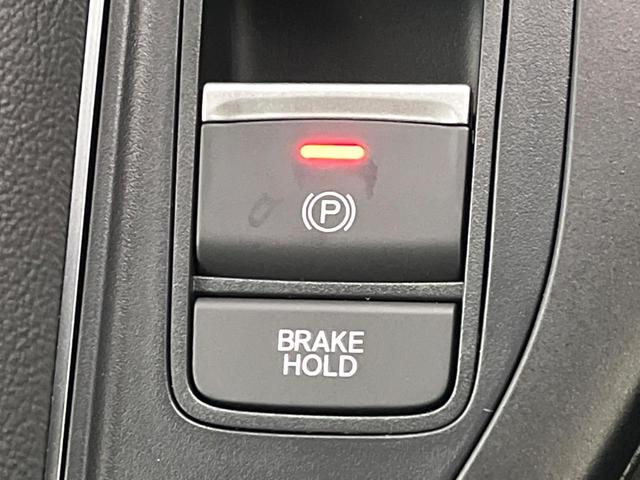 ステップワゴン ｅ：ＨＥＶスパーダ　登録済未使用車　純正１１型ナビ　両側電動ドア　パワーバックドア　ホンダセンシング　レーダークルーズコントロール　前席シートヒーター　ハーフレザーシート　ＬＥＤヘッドライト　前席シートバックテーブル（63枚目）