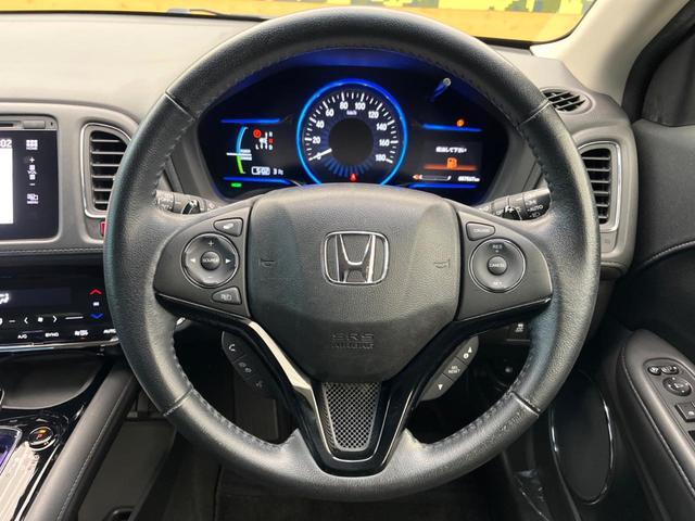 ヴェゼル ハイブリッドＺ　禁煙車　メーカー純正ナビ　フルセグ　バックカメラ　クルーズコントロール　シティブレーキアクティブシステム　ハーフレザーシート　ＬＥＤヘッド　ビルトインＥＴＣ　オートライト　ＣＤ　ＤＶＤ再生（14枚目）