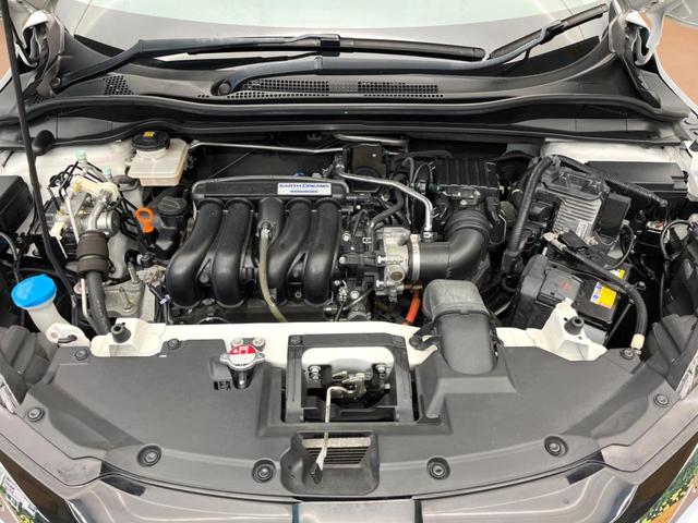 ヴェゼル ハイブリッドＺ　禁煙車　メーカー純正ナビ　フルセグ　バックカメラ　クルーズコントロール　シティブレーキアクティブシステム　ハーフレザーシート　ＬＥＤヘッド　ビルトインＥＴＣ　オートライト　ＣＤ　ＤＶＤ再生（21枚目）