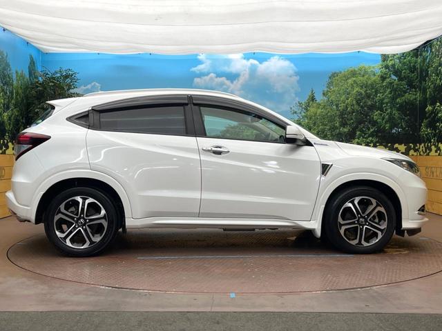 ヴェゼル ハイブリッドＺ　禁煙車　メーカー純正ナビ　フルセグ　バックカメラ　クルーズコントロール　シティブレーキアクティブシステム　ハーフレザーシート　ＬＥＤヘッド　ビルトインＥＴＣ　オートライト　ＣＤ　ＤＶＤ再生（30枚目）