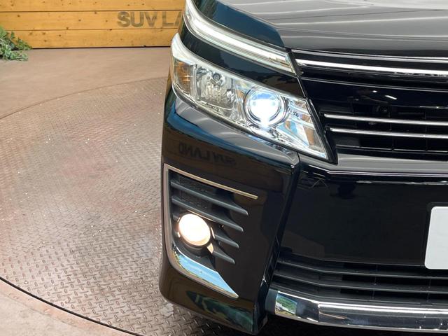 ヴォクシー ZS 煌 純正9型ナビ 両側電動スライド バックカメラ LEDヘッドライト オートライト フルセグ ETC デュアルオートエアコン スマートキー CD/DVD再生 Bluetooth接続 革巻きハンドル(12枚目)