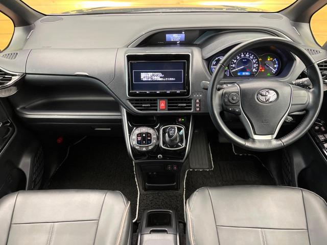 ヴォクシー ハイブリッドＺＳ　煌ＩＩＩ　１２型フリップダウンモニター　純正９インチナビ　トヨタセーフティセンス　禁煙車　両側電動ドア　シートヒータークルーズコントロール　クリアランスソナー　フルセグ　Ｂｌｕｅｔｏｏｔｈ　バックカメラ（2枚目）