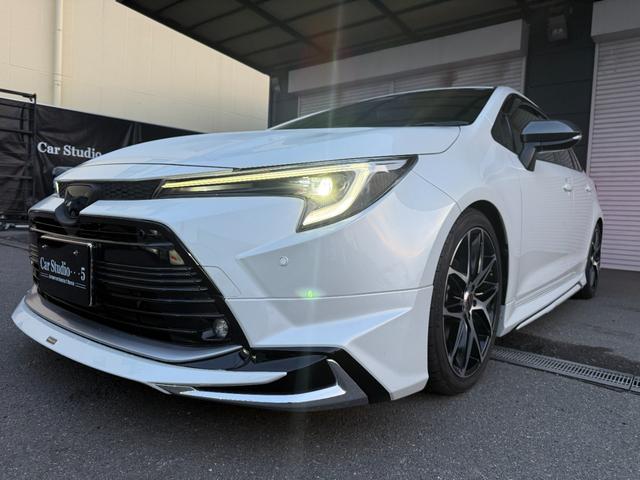 カローラツーリング ハイブリッド ダブルバイビー モデリスタフルエアロ ALPINEデジタルインナーミラー 外品18インチAW 10.5インチディスプレイオーディオ BSM バックモニターETC シートカバー ローダウン(5枚目)