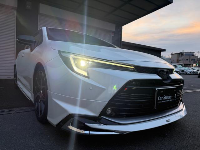 カローラツーリング ハイブリッド ダブルバイビー モデリスタフルエアロ ALPINEデジタルインナーミラー 外品18インチAW 10.5インチディスプレイオーディオ BSM バックモニターETC シートカバー ローダウン(6枚目)