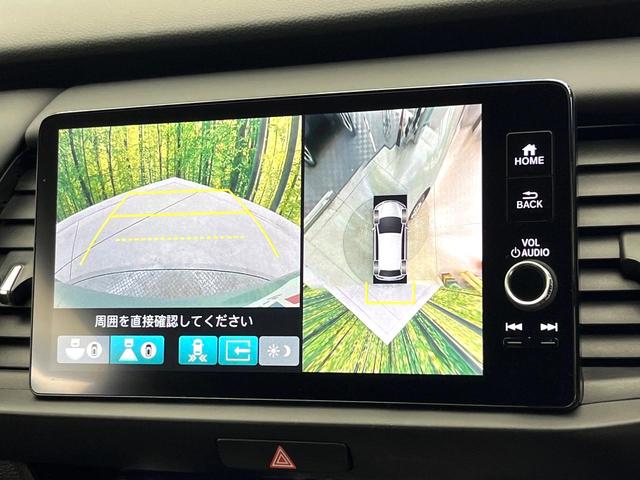 フィット ｅ：ＨＥＶホーム　純正９型ディスプレイオーディオ　禁煙車　全周囲カメラ　ブラインドスポットモニター　ホンダセンシング　フルセグ　ハーフレザー　アダプティブクルーズ　ＬＥＤヘッド　ＥＴＣ２．０　電動パーキング（5枚目）