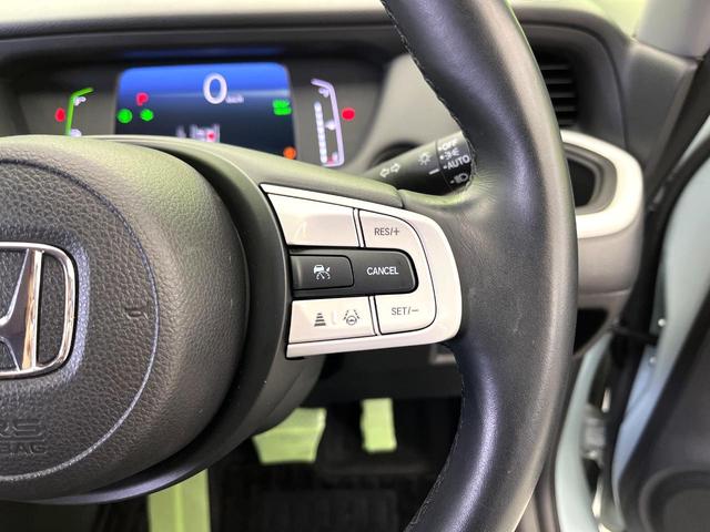フィット ｅ：ＨＥＶホーム　純正９型ディスプレイオーディオ　禁煙車　全周囲カメラ　ブラインドスポットモニター　ホンダセンシング　フルセグ　ハーフレザー　アダプティブクルーズ　ＬＥＤヘッド　ＥＴＣ２．０　電動パーキング（48枚目）