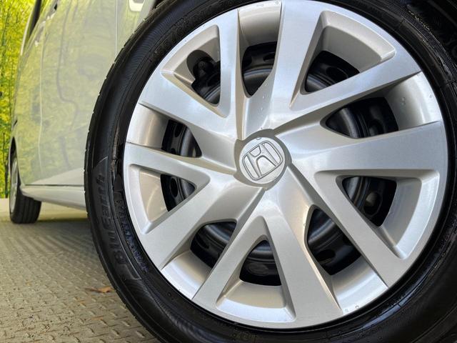 N-BOX ベースグレード 衝突軽減 禁煙車 アダプティブクルーズ 電動スライドドア クリアランスソナー 電動パーキング LEDヘッドライト オートハイビーム スマートキー オートエアコン 踏み間違い防止 車線逸脱警報(14枚目)