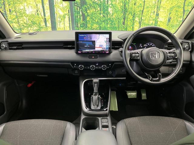 ヴェゼル ｅ：ＨＥＶ　Ｚ　９型メモリーナビ　バックカメラ　ホンダセンシング　ハンズフリーパワーバックドア　ハーフレザーシート　シートヒーター　ブラインドスポットモニター　ＥＴＣ　ドラレコ　フルセグ　スマートキー（3枚目）