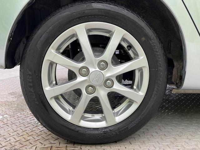 ミライース Ｘ　純正１４インチアルミホイール　フォグライト　ＣＤ／ＤＶＤ再生　盗難防止装置　プライバシーガラス　アイドリングストップ　ヘッドライトレベライザー　キーレス　電動格納ミラー　ＡＢＳ（31枚目）