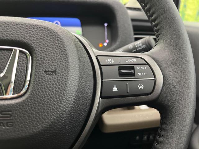 フリード e:HEVエアー EX 登録済未使用車 両側電動スライドドア 衝突軽減 アダプティブクルーズ クリアランスソナー LEDヘッドライト シートヒーター オートハイビーム 踏み間違い防止 車線逸脱警報 オートエアコン(5枚目)